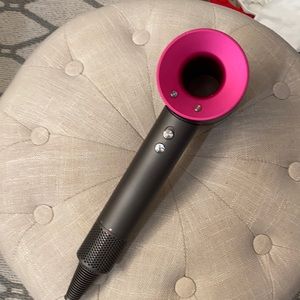 Gray Dyson blow dryer gently used